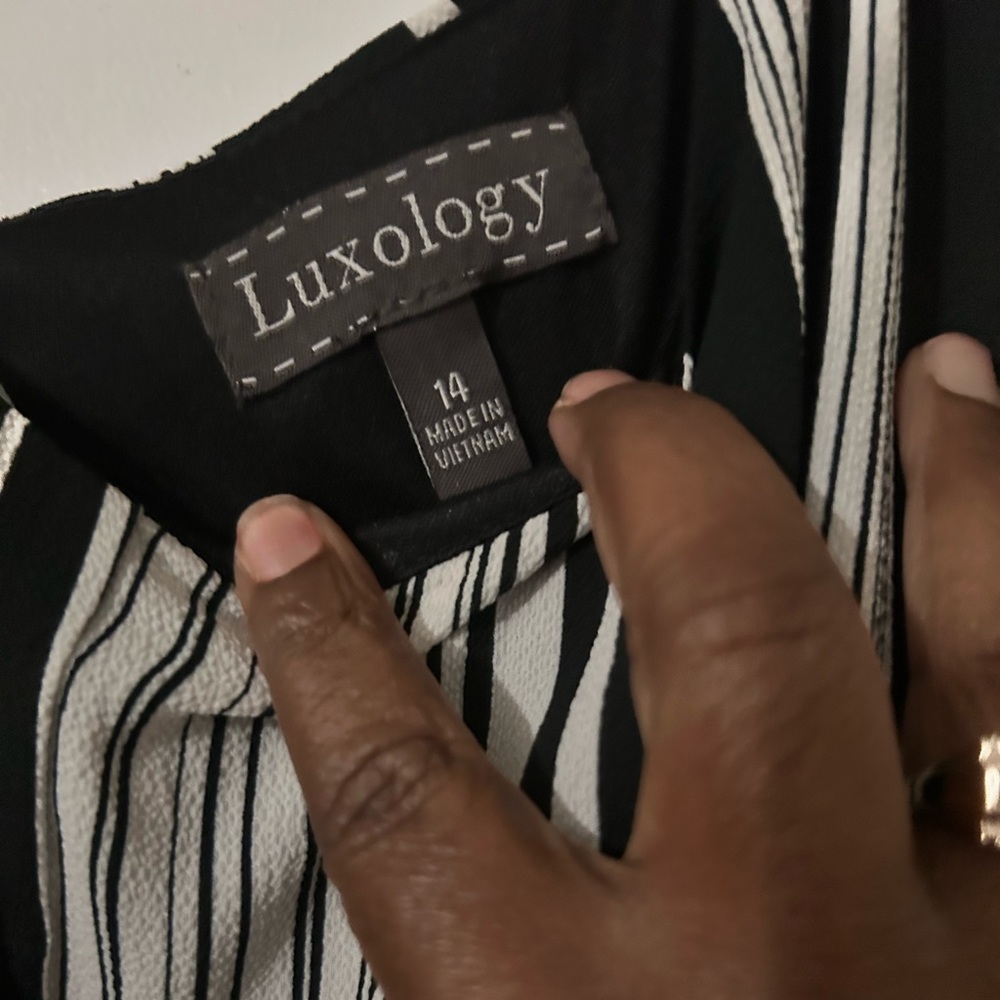 This Luxology jumpsuit is a must-have addition to your wardrobe. Get it NOW!